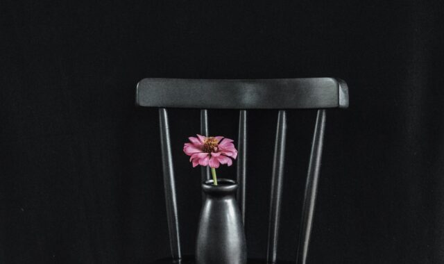 black background, black furniture, sleek furniture