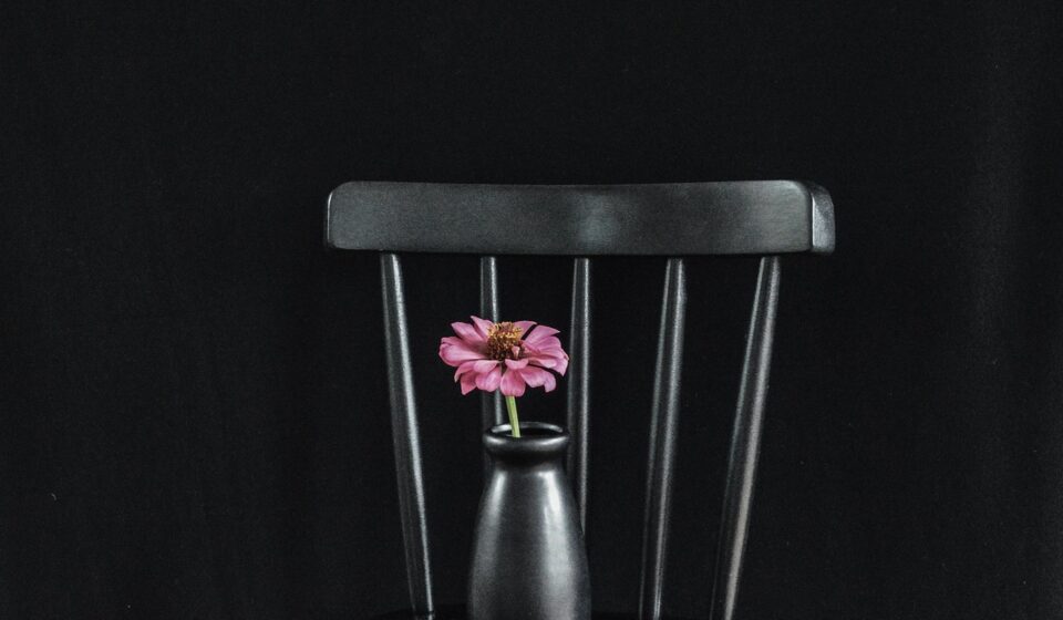 black background, black furniture, sleek furniture