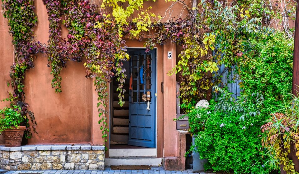 door, building, vegetation, facade, house, town, street, building, house, house, house, house, house